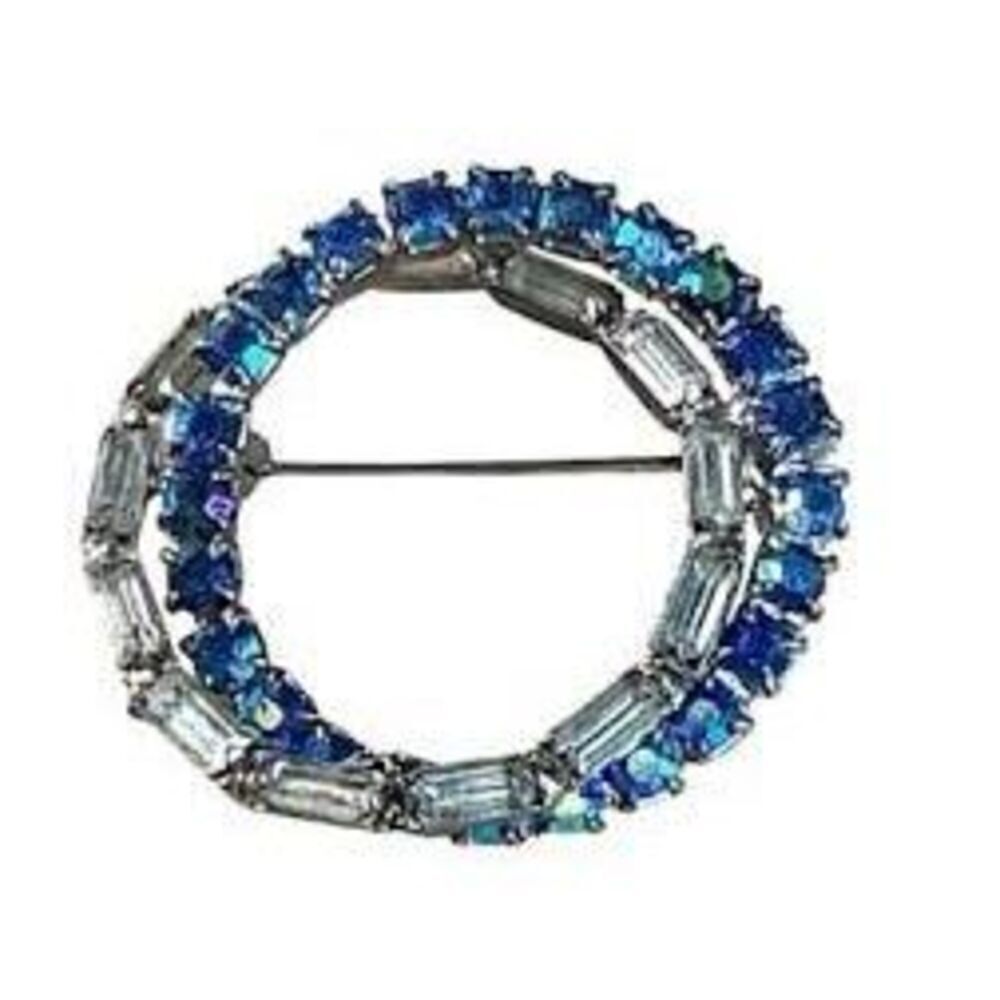 Vintage Aurora Borealis baguette rhinestone inter woven circle brooch.